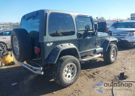 2002 Jeep Wrangler Sahara z USA, uszkodzony, nr VIN 1J4FA59S12P701045
